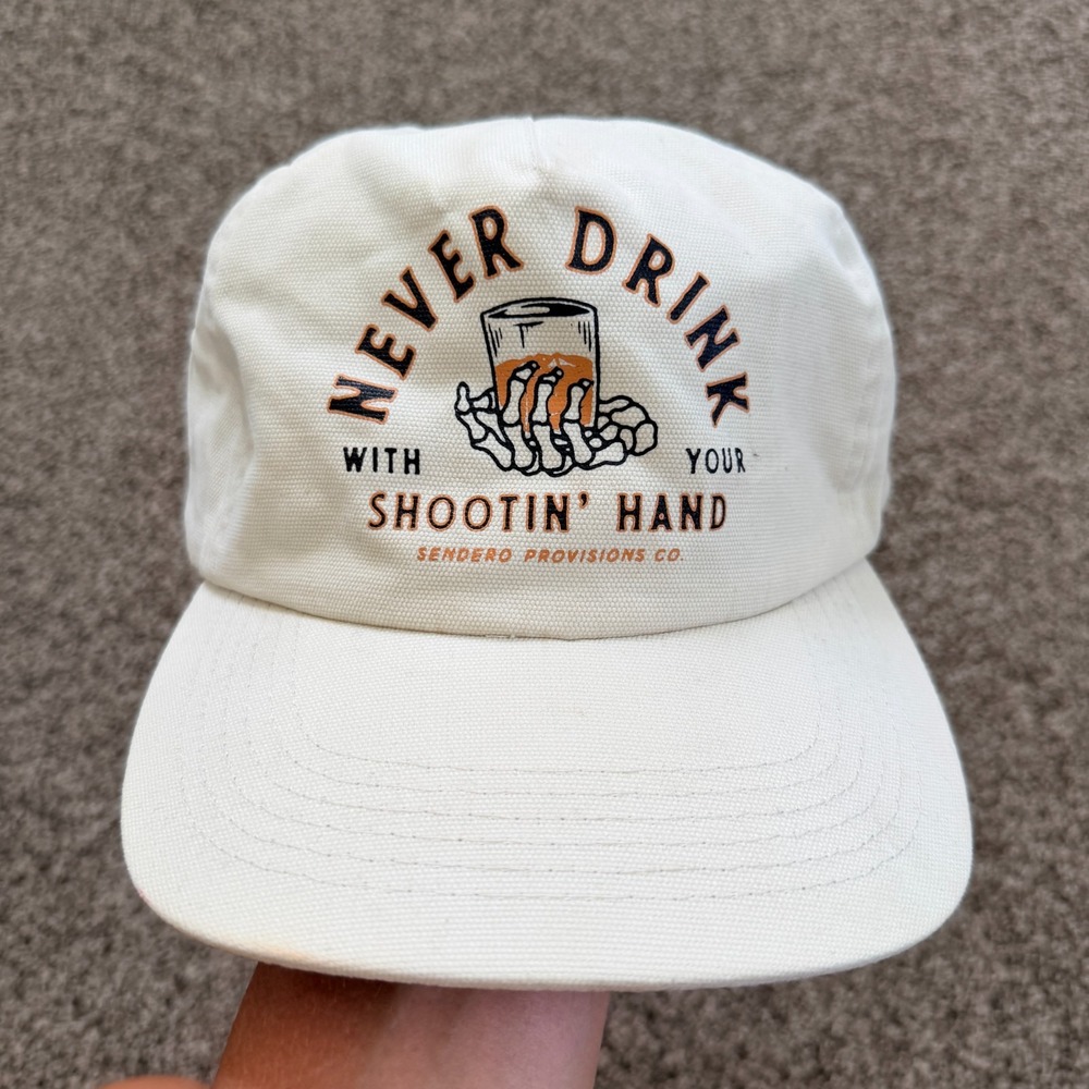 Sendero Provisions Never Drink With Your Shootin' Hand Baseball Hat Ivory Cap